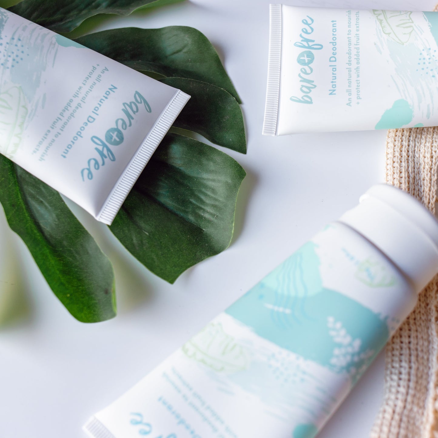Three natural deodorant tubes in Original scent by Bare + Free